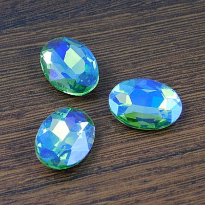 Kaboszon owal fasetowany ze szkła 18x13x5mm zielono-szafirowy (1szt)