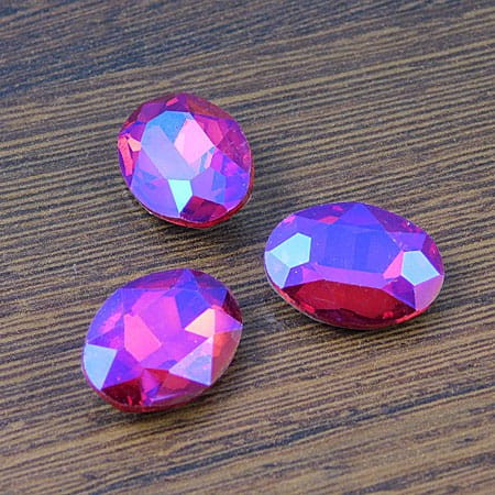 Kaboszon owal fasetowany ze szkła 18x13x5mm fuksja-fiolet (1szt)