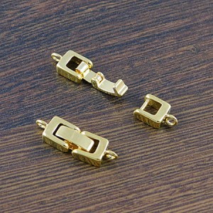 Zapięcie zegarkowe z metalu 23x7x4mm złote (1kpl.)