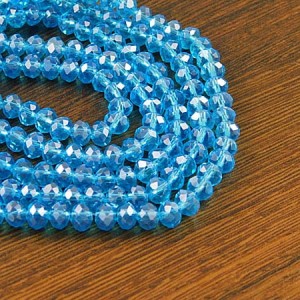 Oponki fasetowane ze szkła 6x4.5mm niebieskie z połyskiem (20szt.)