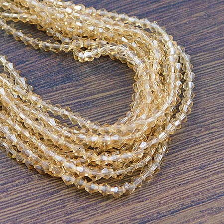 koraliki-bicone-szklo-3mm-jasny-bursztyn-fasetowane-diy