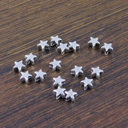 Przekładka metalowa gwiazdka 5x3mm ciemna srebrna (20szt)