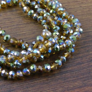 Oponki fasetowane ze szkła 6x4.5mm bursztynowe z połyskiem (20szt)