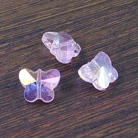 Motylki szlifowane ze szkła 15x12mm różowe AB (2szt.)