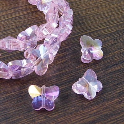 Motylki szlifowane ze szkła 15x12mm różowe AB (2szt.)