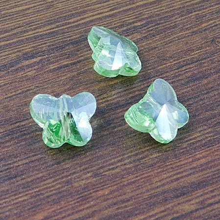 Motylki szlifowane ze szkła 15x12mm jasne zielone AB (2szt.)