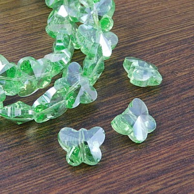 Motylki szlifowane ze szkła 15x12mm jasne zielone AB (2szt.)
