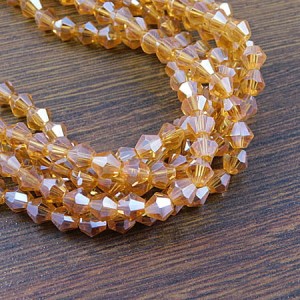 Kryształki bicone ze szkła 6mm bursztynowe z perłowym połyskiem (45szt.)