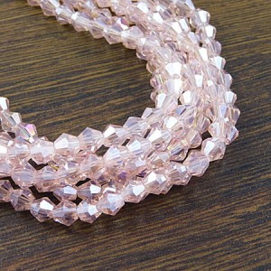 Kryształki bicone ze szkła 6mm jasno różowe AB (45szt.)