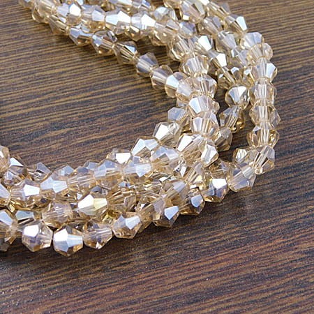 beżowe-kryształki-szklane-bicone-6mm-ab-diy