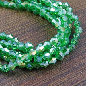 Kryształki bicone ze szkła 6mm zielone AB (45szt.)