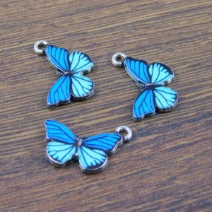 Zawieszka motyl z metalu i emalii 20x13mm niebieska (1szt.)