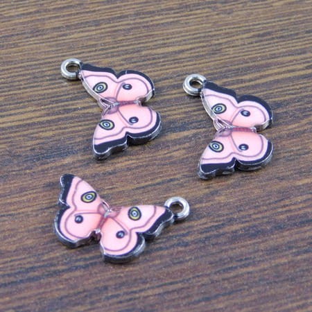 Zawieszka motyl z metalu i emalii 20x13mm różowa (1szt.)