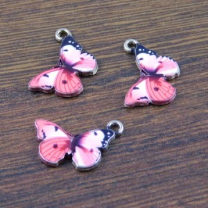 Zawieszka motyl z metalu i emalii 20x13mm różowa (1szt.)