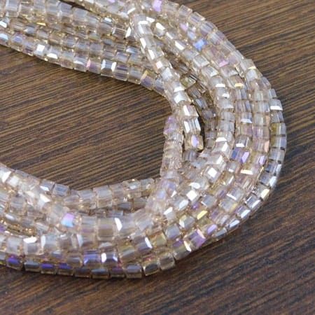 Kostki fasetowane ze szkła 3.5x3.5mm beżowe AB (20szt.)