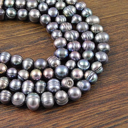 Perła słodkowodna 8-7.5x7-6mm ciemna szara (4szt.)