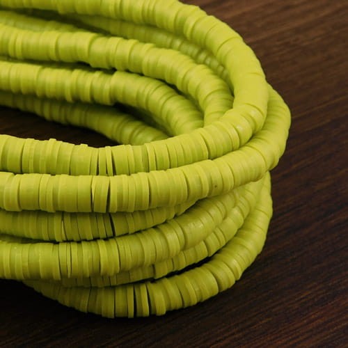 Koraliki Heishi 6x1mm limonkowe (sznur 45cm)