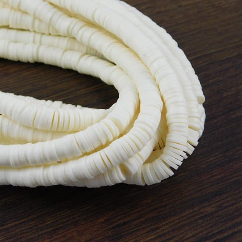 Koraliki Heishi 6x1mm kremowe (sznur 45cm)