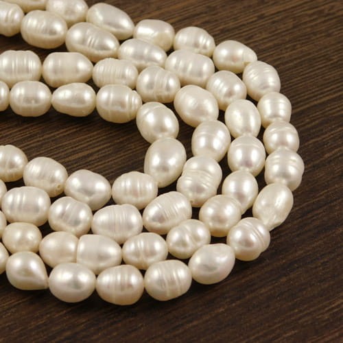 Perły słodkowodne hodowlane 9-11x6-7mm biało-kremowe (4szt.)