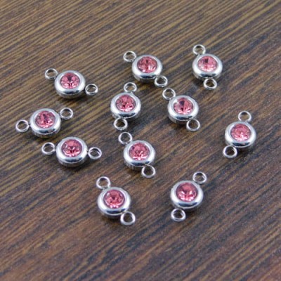 Łącznik ze stali nierdzewnej z cyrkonią różową 12x6.5mm (1szt)