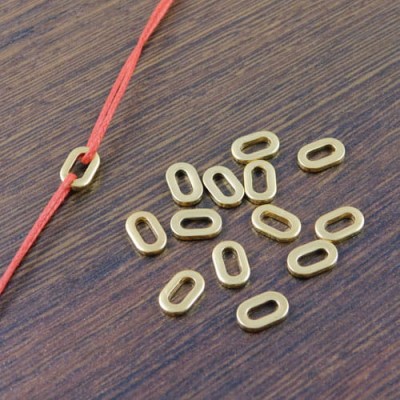 Łącznik owal stal nierdzewna 9x5.5mm złoty (1szt)