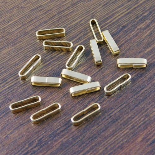 Łącznik owal stal nierdzewna 12x3.5x2.5mm złoty (1szt)