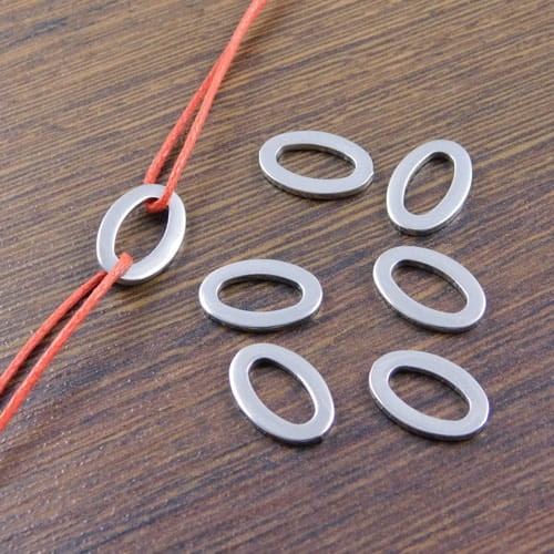 Łącznik owal stal nierdzewna 15x10mm ciemny srebrny (1szt)