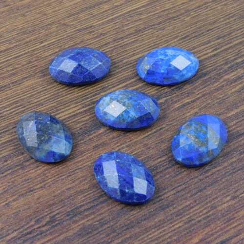 Kaboszon owal fasetowany lapis lazuli 18x13x5.5mm (1szt.)