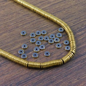 Hematyt krążki ciemne złote 4x1mm (350szt.)