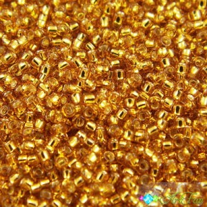 TOHO Round 15/0 Silver - Lined Topaz (5g)