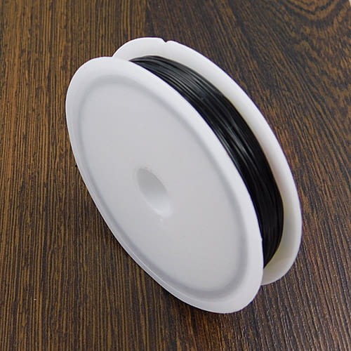 Żyłka elastyczna na szpulce 0.6mm czarna (11metrów)