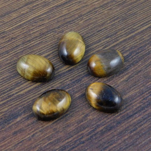 Kaboszon tygrysie oko owal 14x10x4.5mm (1szt.)