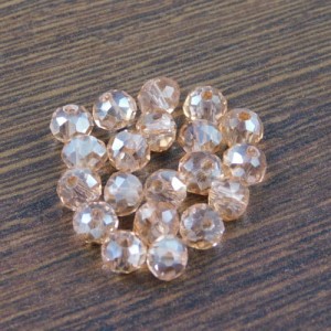 Oponki fasetowane ze szkła 6x4.5mm brudny róż z połyskiem (20szt.)