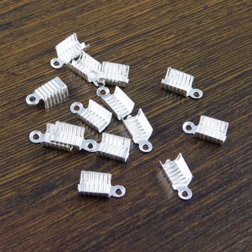 Zacisk z metalu 12x6x4.5mm srebrny (10szt.)