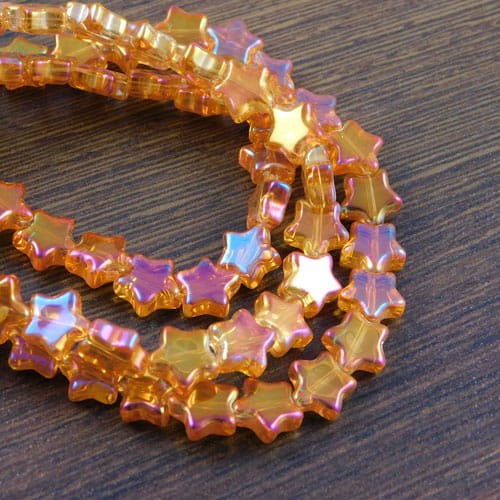 Gwiazdki ze szkła 8.5x3.5mm rude z połyskiem (10szt.)