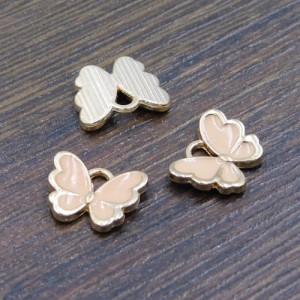 Zawieszka motyl blady róż z metalu i emalii 13x10.5mm (1szt)