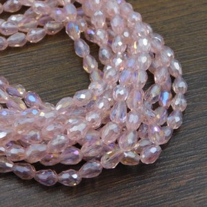 Krople łzy fasetowane szklane 8-7x6mm różowe przezroczyste AB (20szt.)