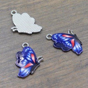 Zawieszka motyl z metalu i emalii 24.5x16mm granatowa (1szt)