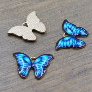 Zawieszka motyl z metalu i emalii 22.5x16mm niebieska (1szt.)