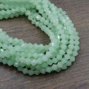 Kryształki bicone ze szkła 4.5x4mm jasno zielone (85szt.)