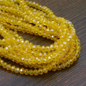 Oponki fasetowane ze szkła 4x3.5mm żółte z połyskiem (110szt.)