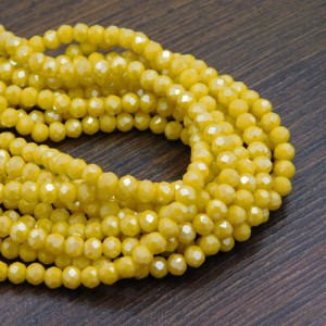 Oponki fasetowane ze szkła 4x3.5mm żółte z połyskiem (110szt.)