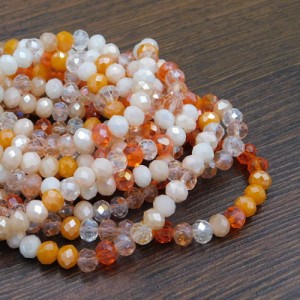 Oponki fasetowane szklane 6x5mm mix pomarańczowy (około 90szt.)