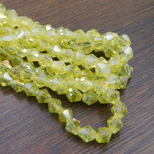 krysztalki-szklane-bicone-8mm-zolte-ab-przezroczyste