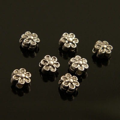 Przekładka metalowa kwiatek 6mmx4mm ciemna srebrna (10szt)
