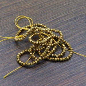 Oponki fasetowane ze szkła 2x1.5mm złote metaliczne (220szt.)