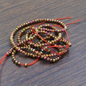 Oponki fasetowane ze szkła 2x1.5mm złoto-bordowe (220szt.)