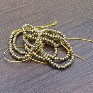 Oponki fasetowane ze szkła 2x1.5mm jasno złote (220szt.)