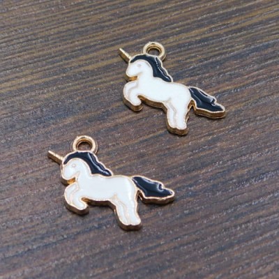 Zawieszka jednorożec z metalu i emalii 21x12mm biało-czarna (1szt.)