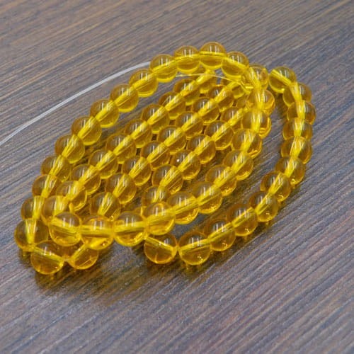 Kulki ze szkła 6-6.5mm przezroczyste żółte (65szt.)